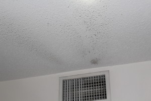 Dust settled o ceiling near AC vent